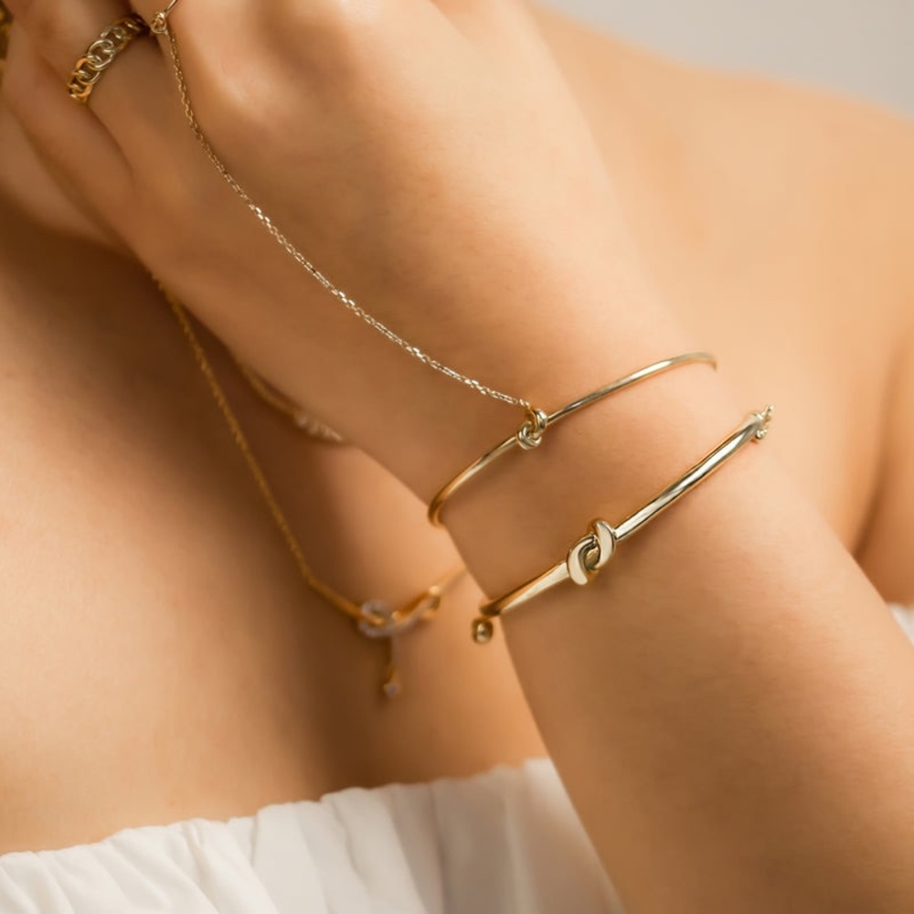 Wanderlust + Co 🌙 18k Filled Rose Gold, Knot Bangle - Picture 2 of 13